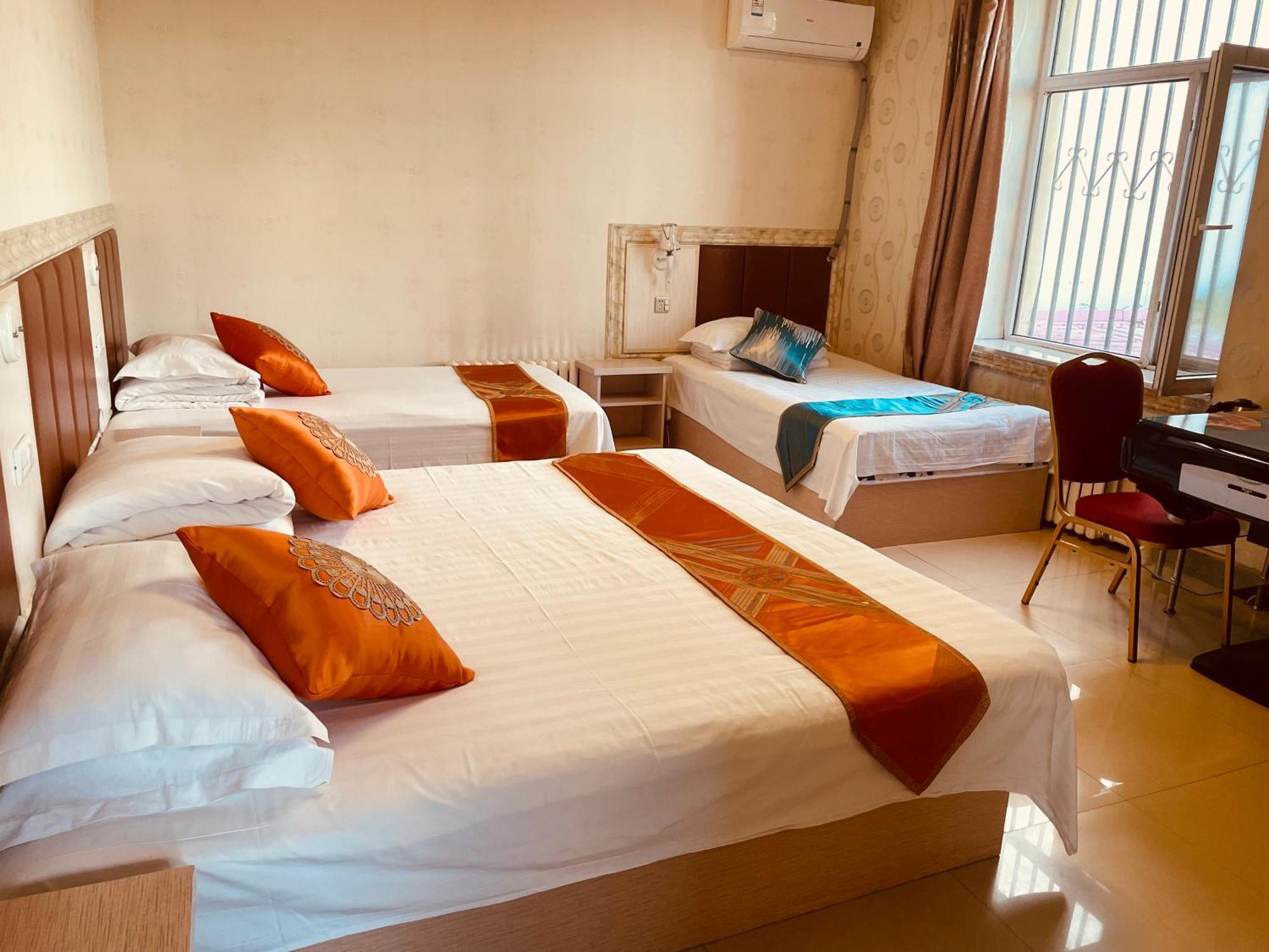 哈尔滨机场东方红运宾馆 Hotell Rom bilde