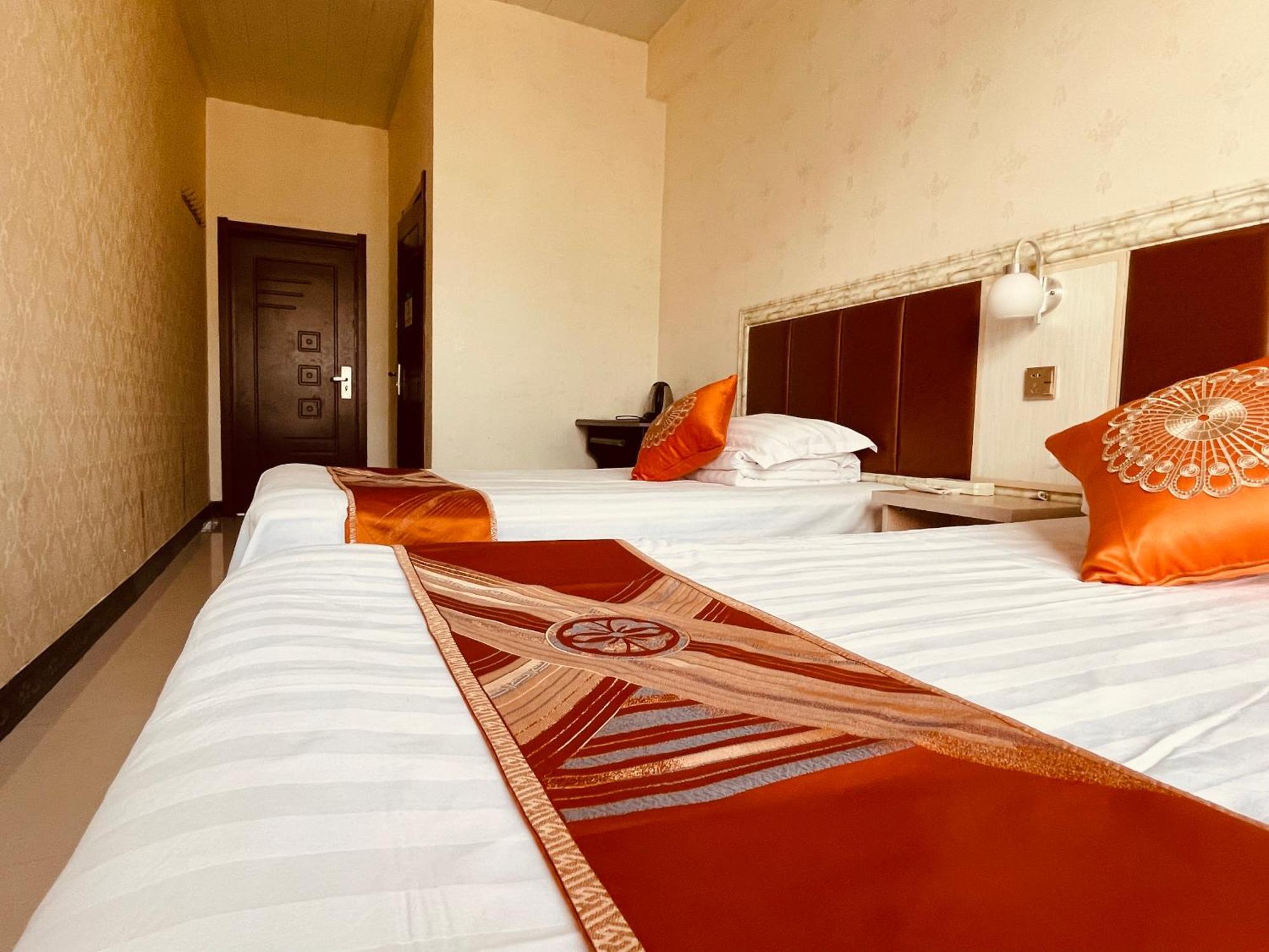 哈尔滨机场东方红运宾馆 Hotell Rom bilde