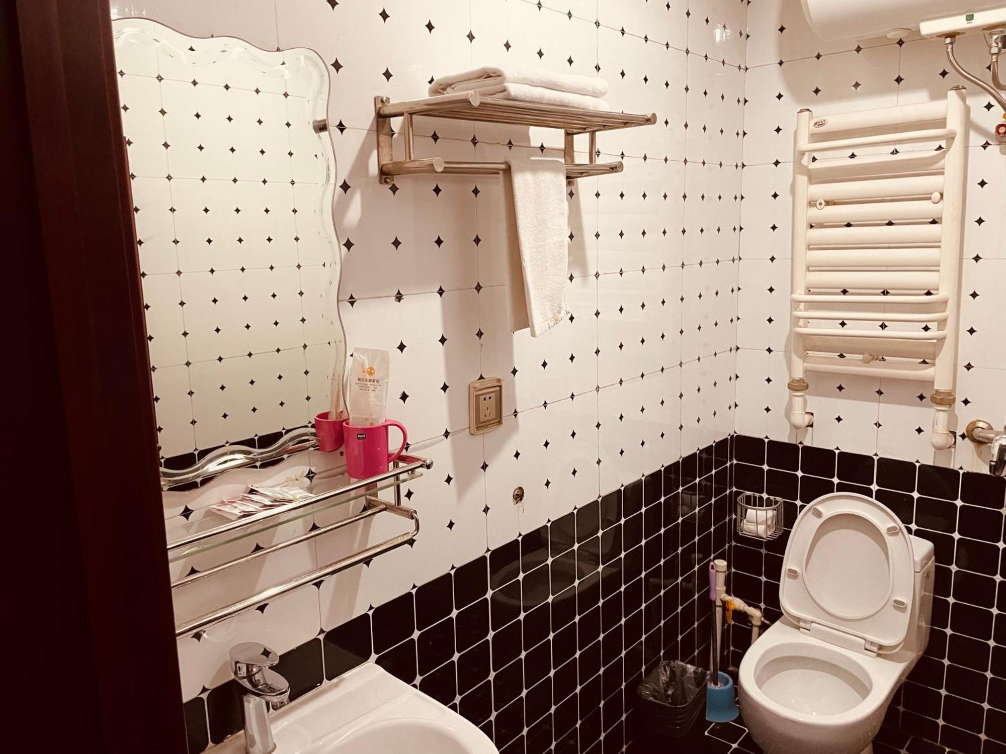 哈尔滨机场东方红运宾馆 Hotell Rom bilde